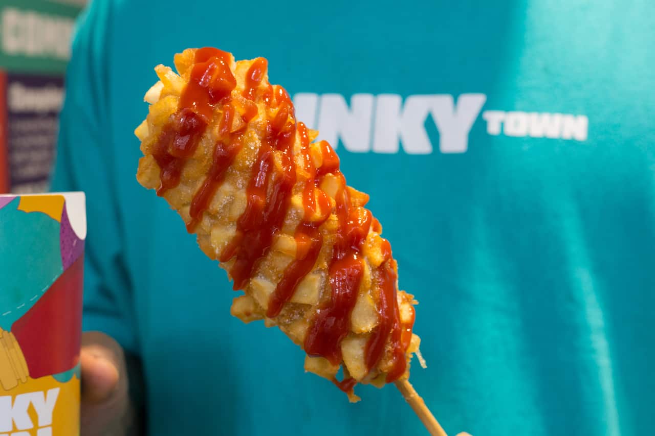 These Korean hot dogs are covered in chips and ramen noodles 