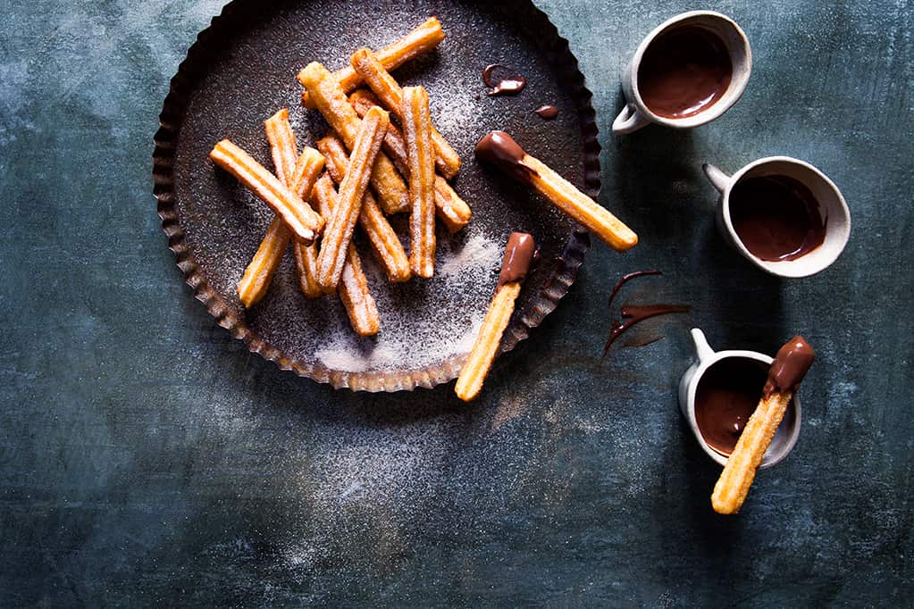 Churros with chocolate-custard sauce