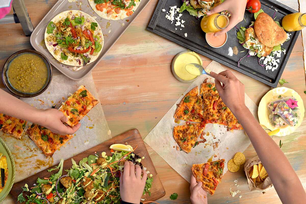Members of the Currumbin Valley enjoying community curry