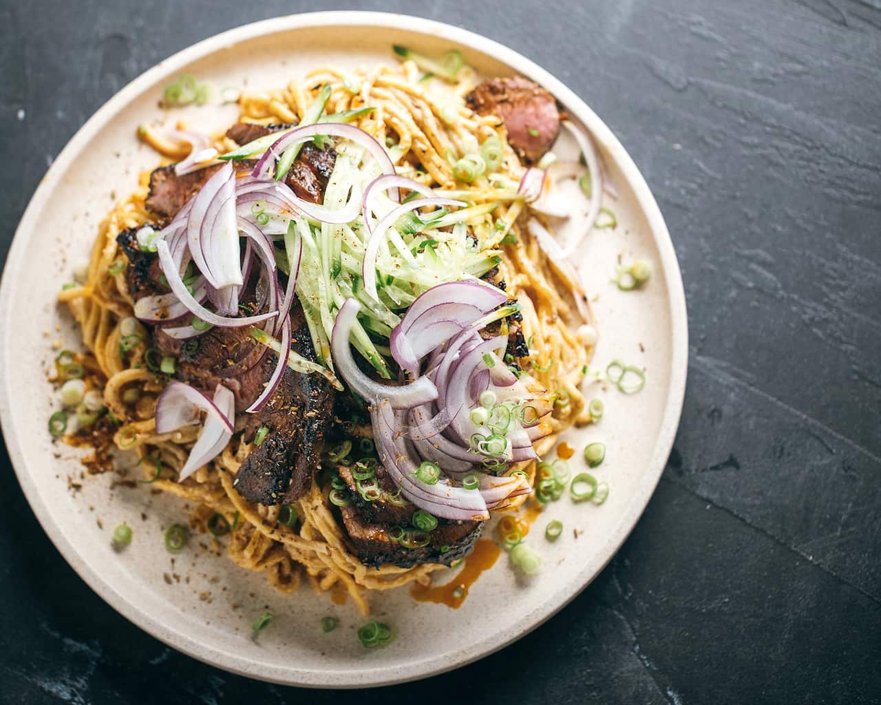 Cumin lamb with sesame noodles