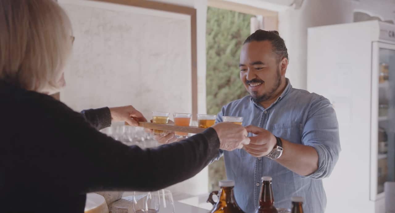 Adam Liaw tasting beer at Cuppitts