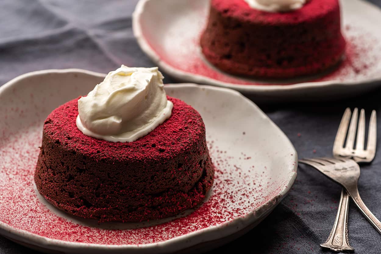 Turn dehydrated raspberry into a flavour-packed garnish for these rich chocolate cake desserts. 