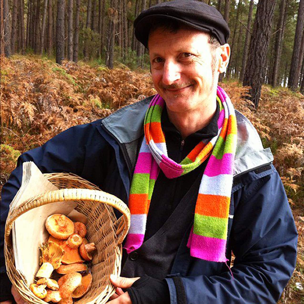Forager Diego Bonetto with a bounty of mushrooms.