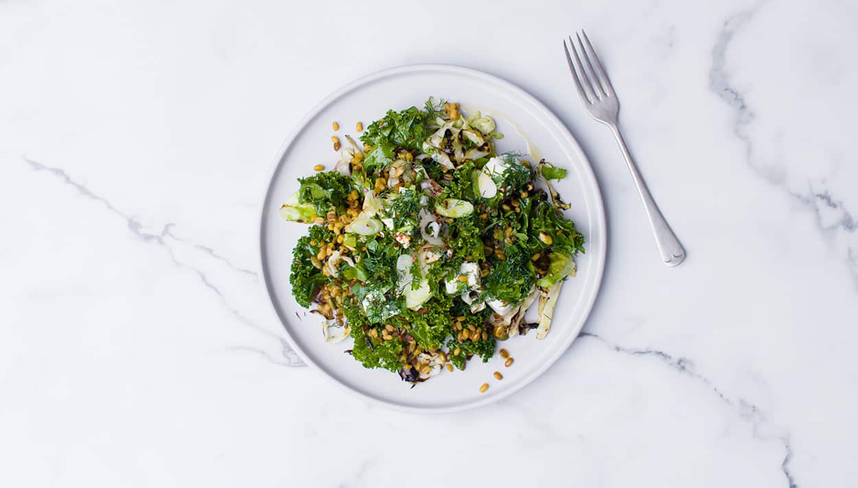 Greens, grains and marinated feta salad