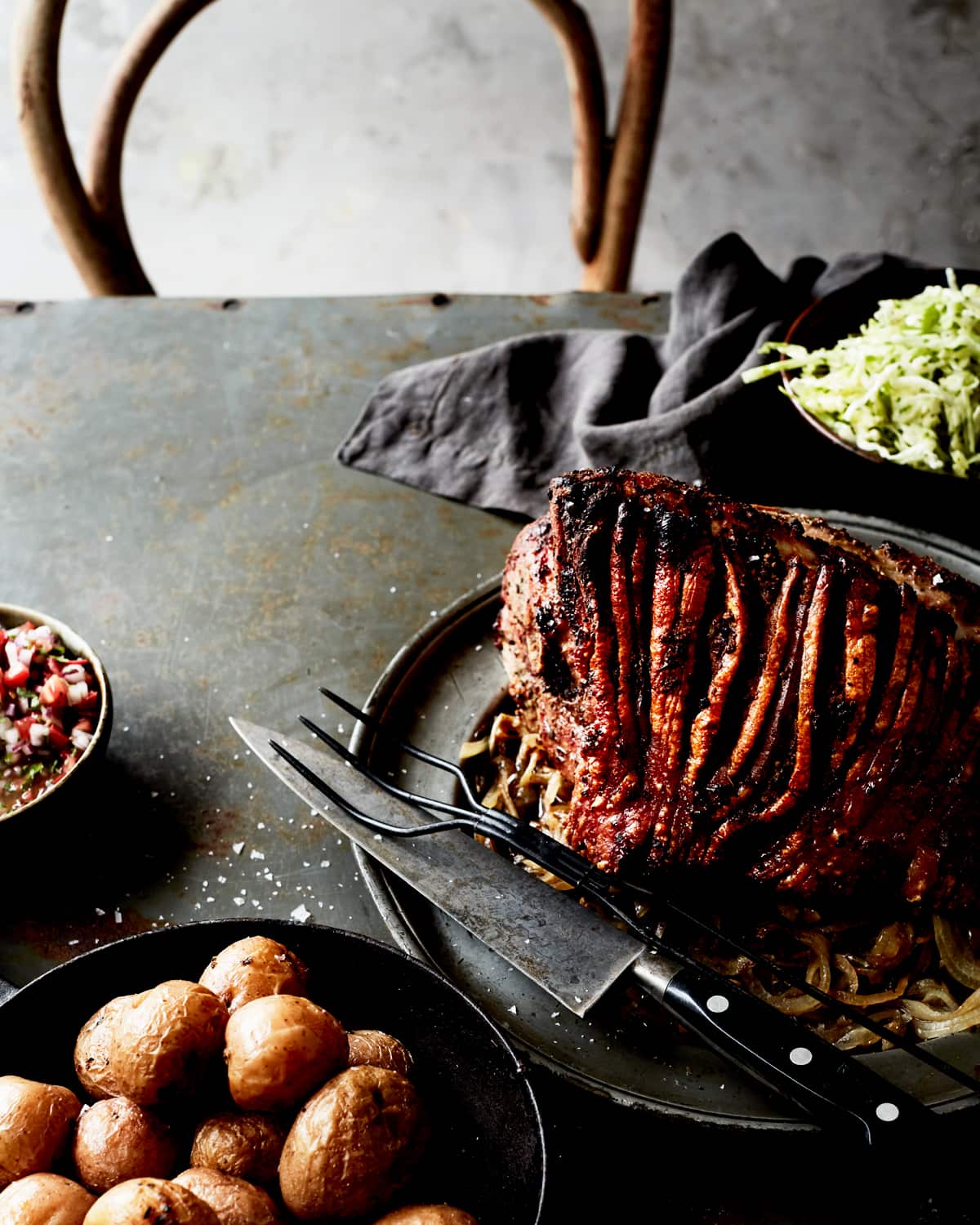 Ecuadorian slow-roasted pork with agrio sauce and salad