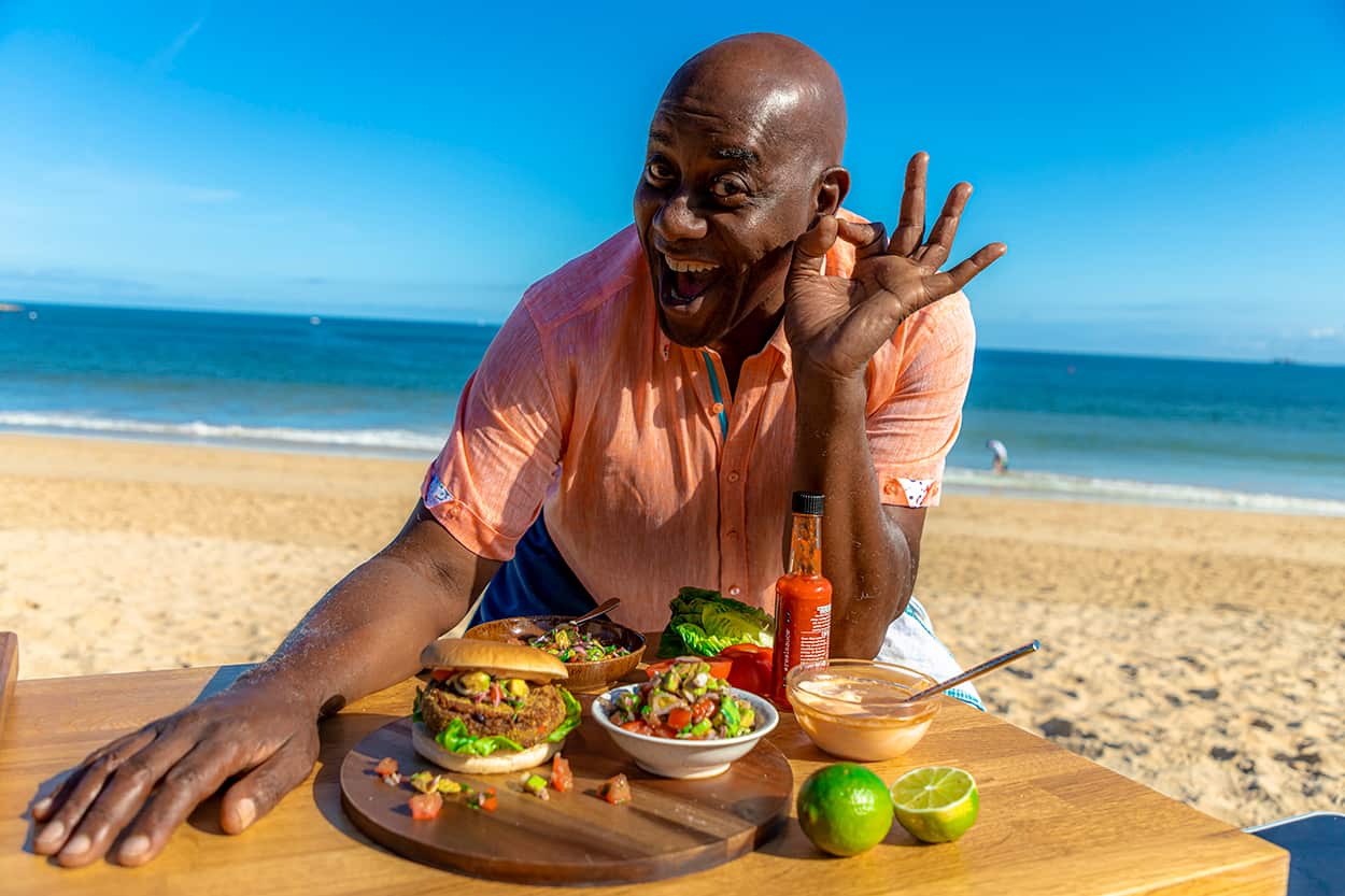 Ainsley Harriot with island black bean burgers 
