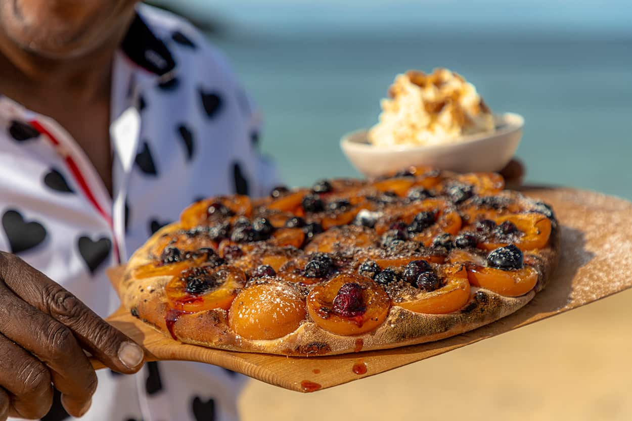sweet pizza topped with apricots and blueberries