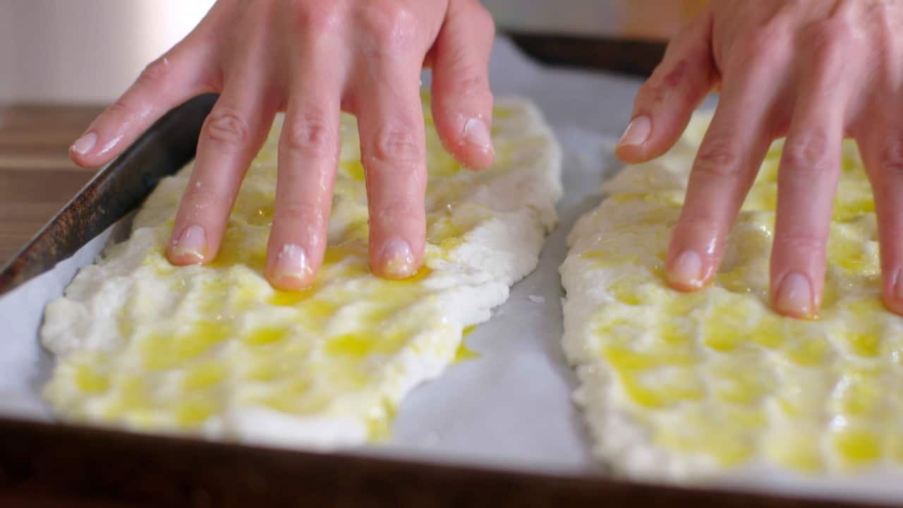 Olive oil on bread dough