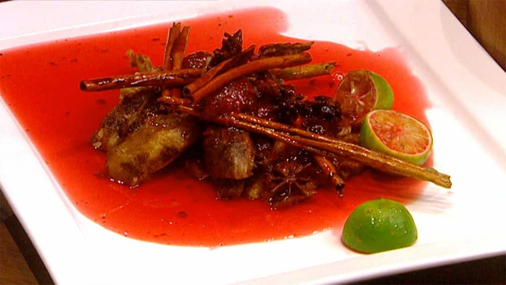 Crispy-skin duck with blood plum sauce