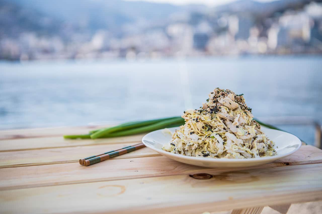 Shredded chicken and cabbage salad with sesame dressing