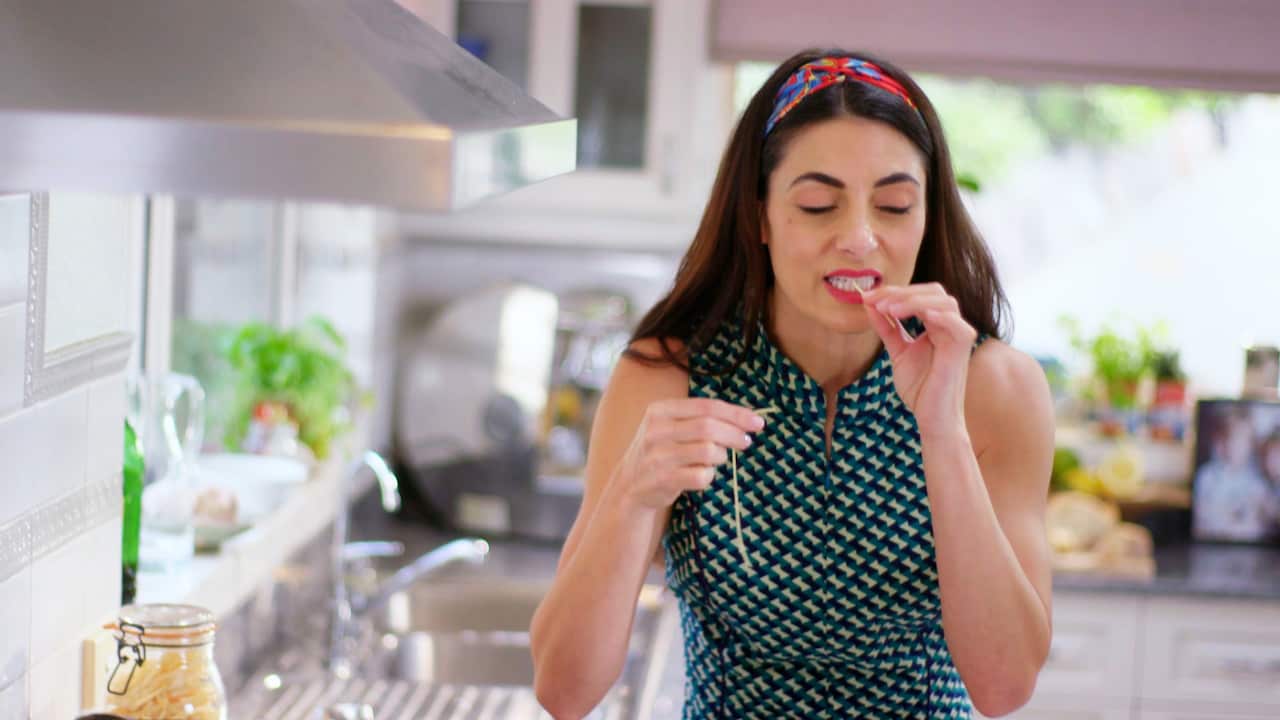 Silvia tasting pasta