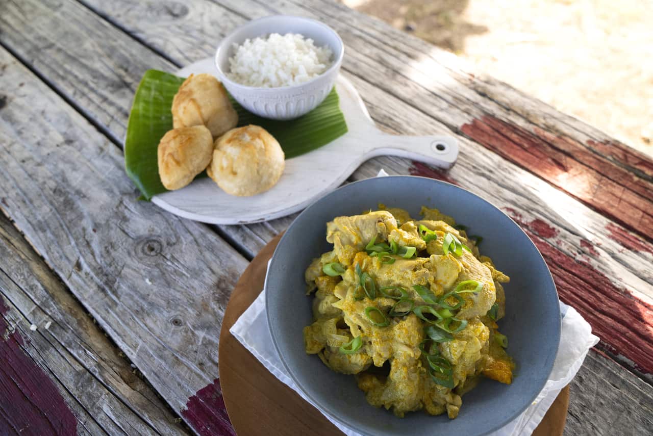 Aka Goeynaw's coconut curry chicken with fried scones.
