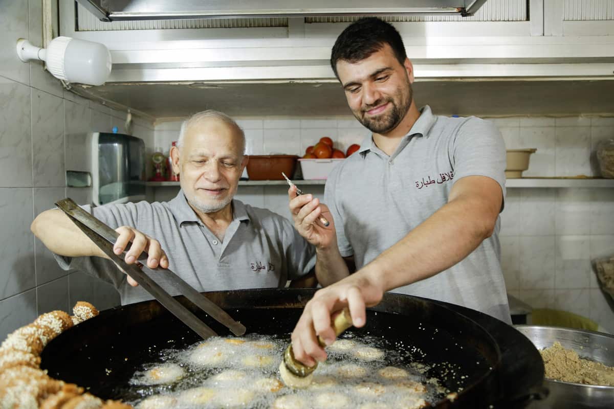 Deep frying falafel.