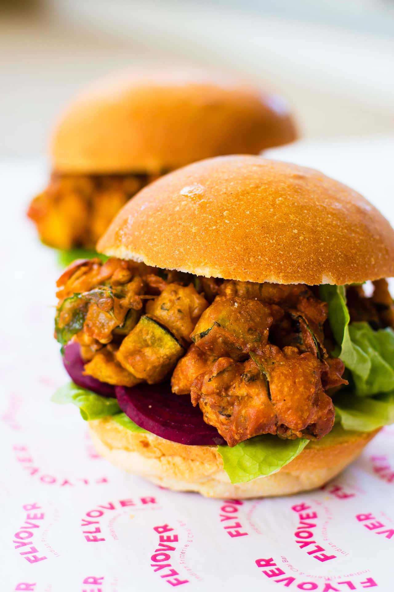 Flyover Fritterie's pao burger with tamarind chutney and cashew mint chutney.
