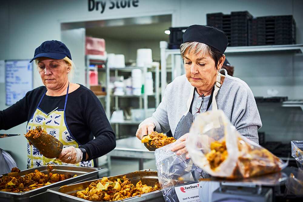 Volunteers work hard in the FoodShare kitchens
