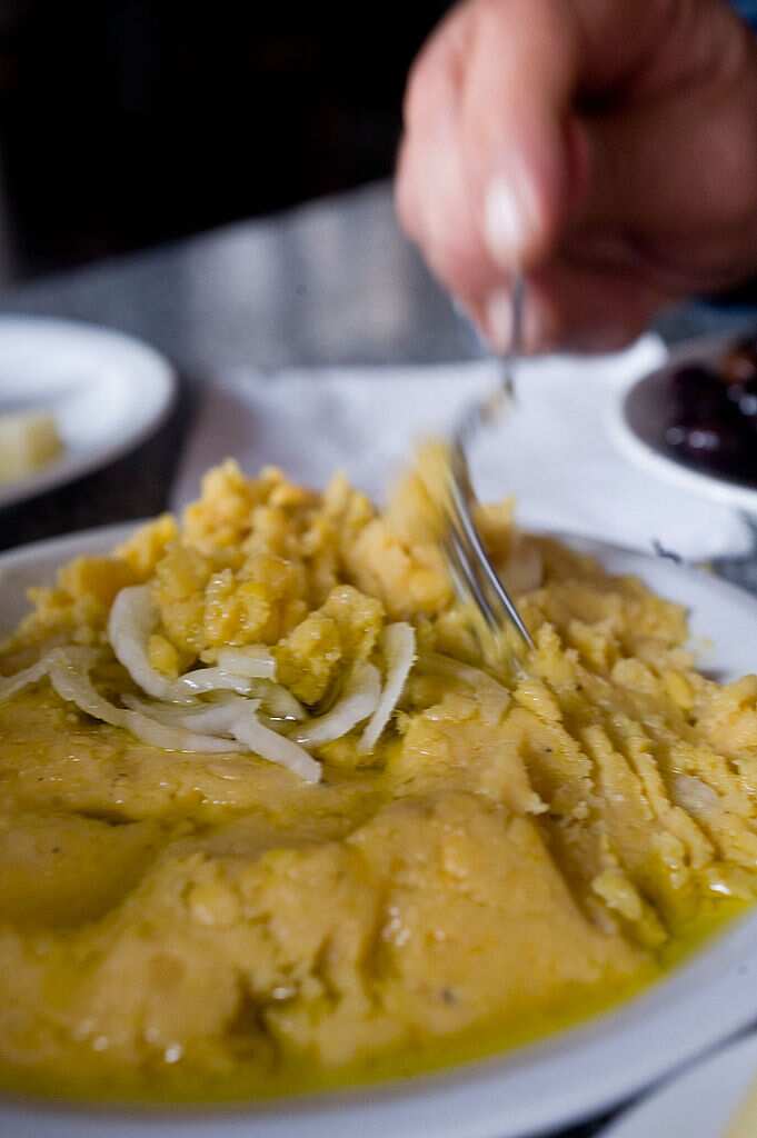 Fava is a traditional legume, boiled and served with olive oil and fresh onion.