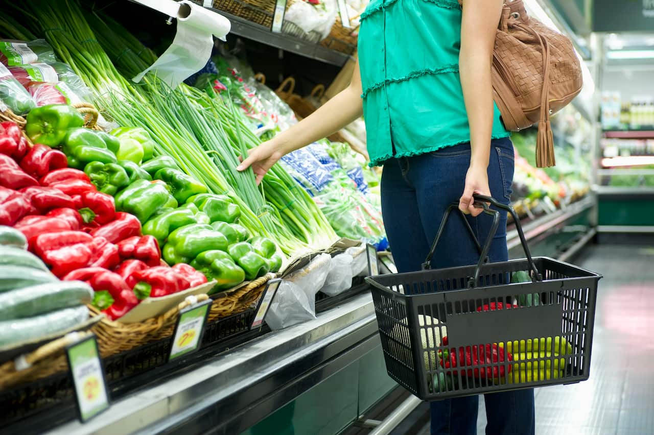 Woman shopping for vegetables