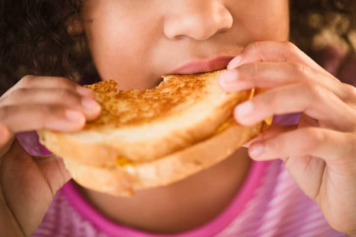 Child eating sandwich
