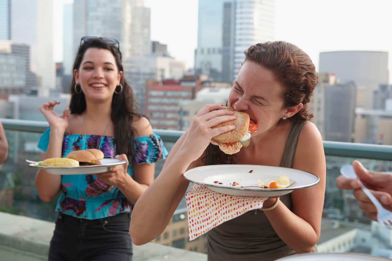 Chew more when you eat out with friends. According to science, it can help you to eat less. 