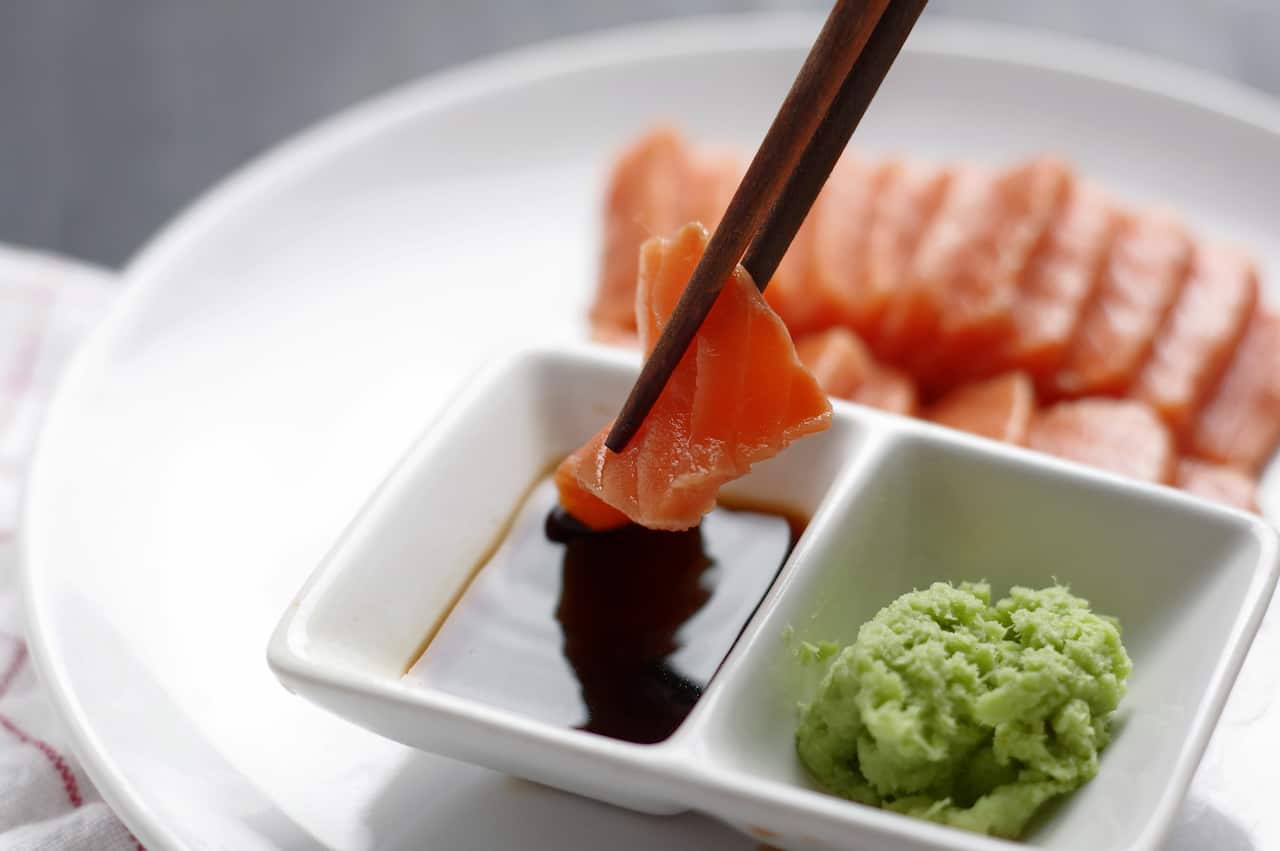 A single tablespoon of the average soy sauce contains 61 percent of our recommended daily salt intake, while a small soy sauce plastic fish packet – the kind you drizzle over a sushi roll – contains 10 per cent of our daily salt intake.