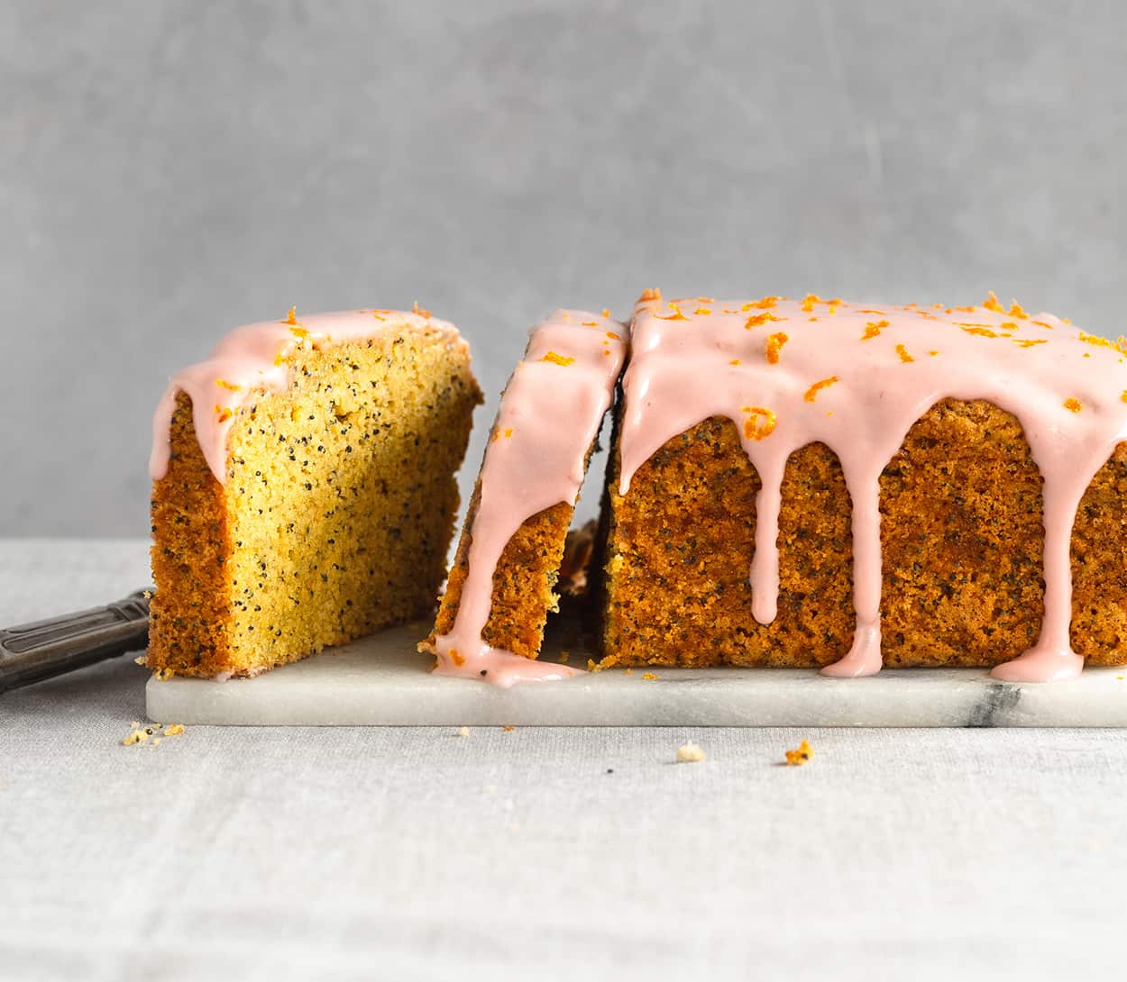 Gluten Free Poppy Seed Tea Cake with Raspberry Cream Cheese Icing
