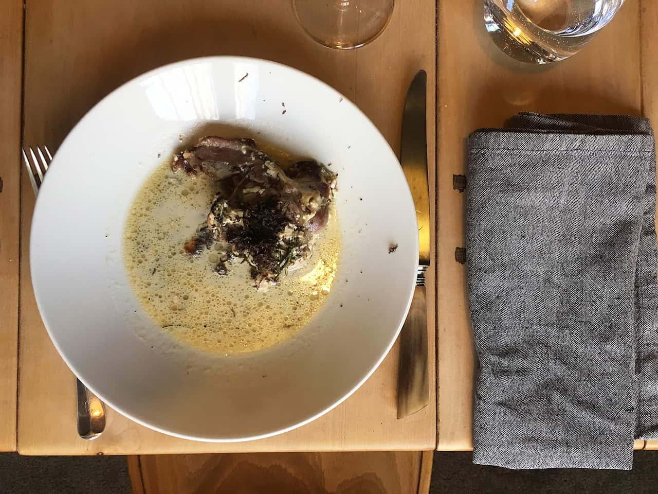 Goat braised in goat's milk with truffle