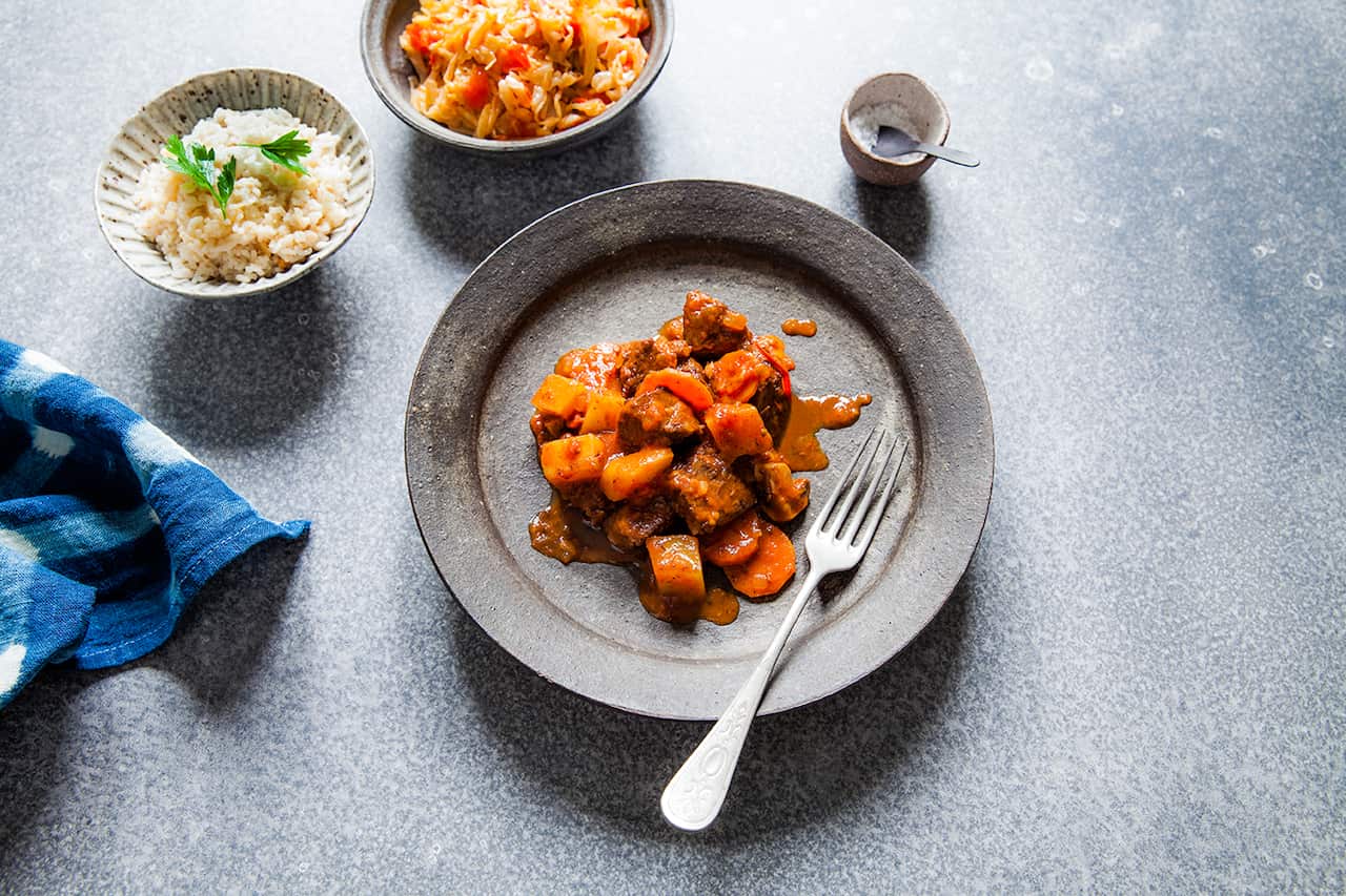 Goat stew potjie with mushrooms