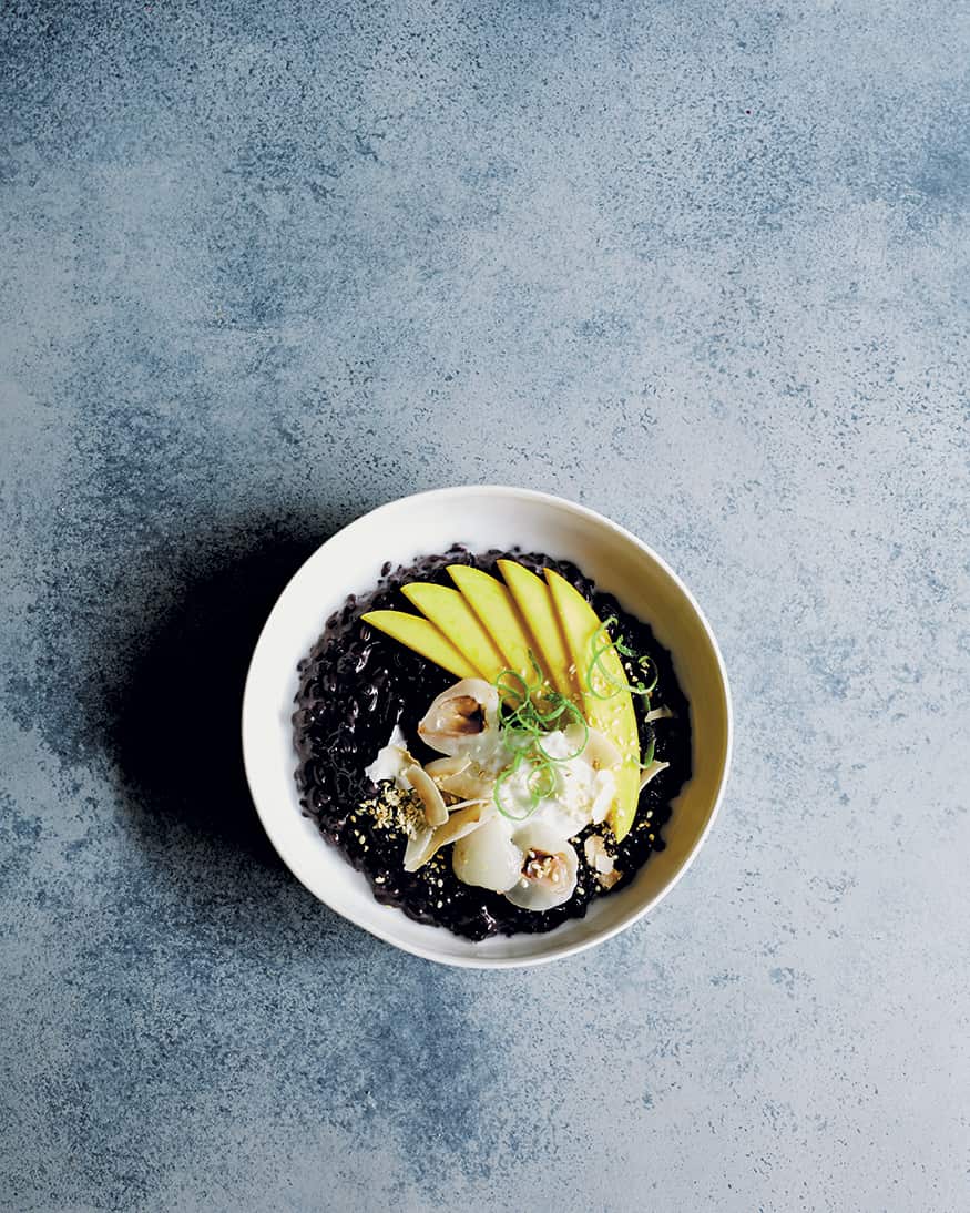 Black rice breakfast with tropical fruit