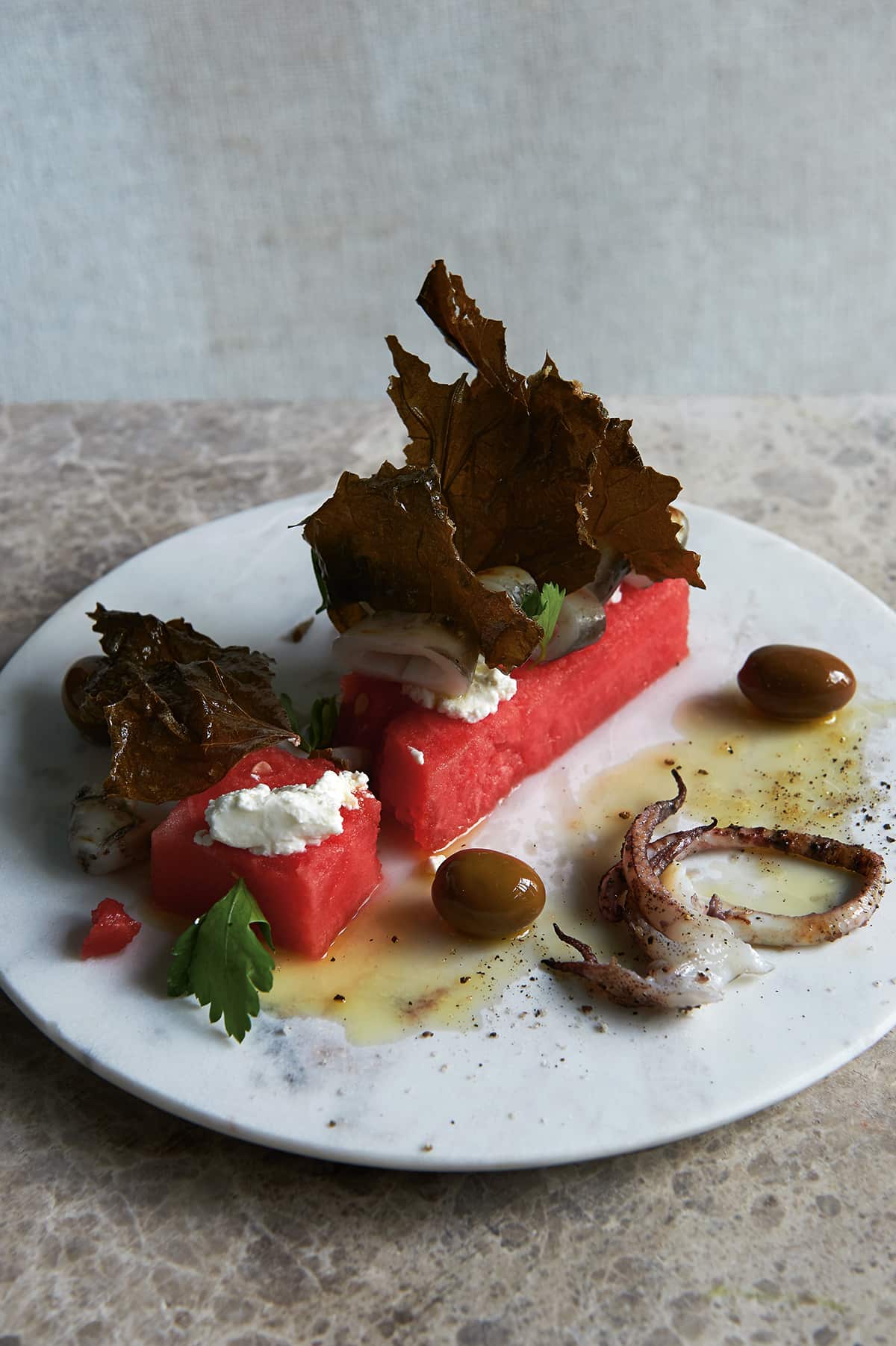 Grilled calamari, watermelon, olives, goat’s curd, crispy vine leaves