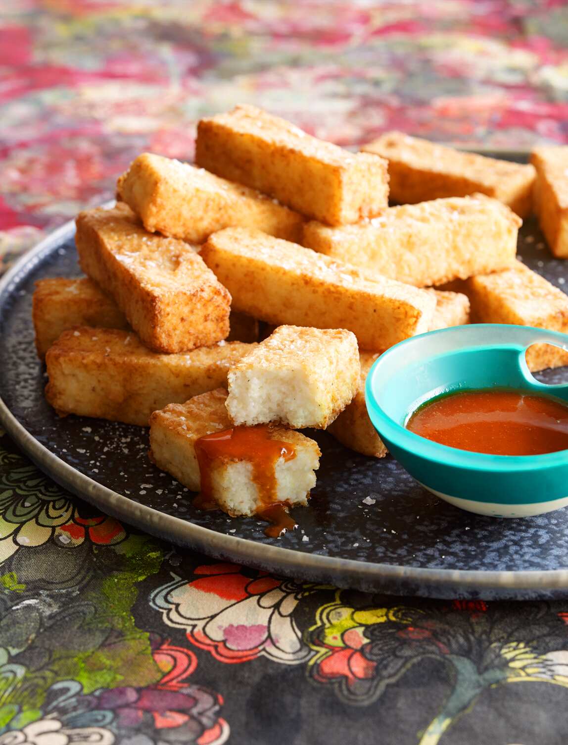 Grits chips with yuzu chilli sauce