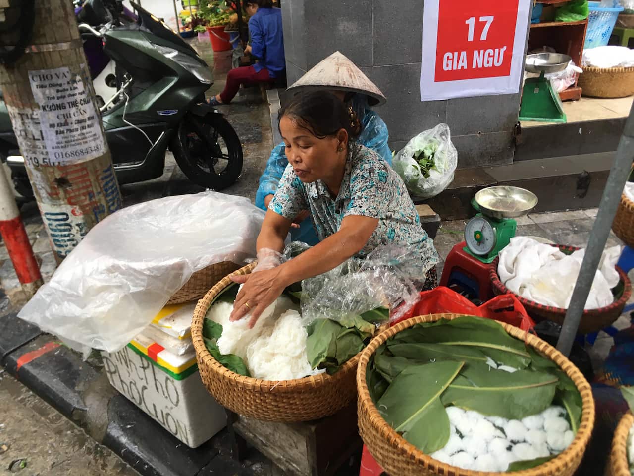 Eating street food in Hanoi.