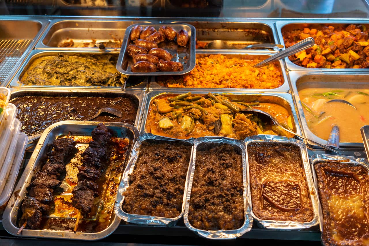 The Filipino dishes at Happy Hut are prepared early each morning then served from bain-maries.