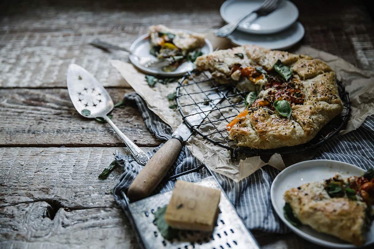 Heirloom tomato galette with lemon balm almond pesto and chevre