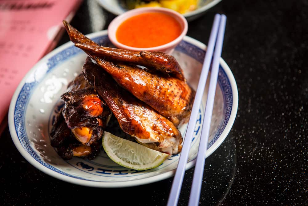 On the menu: barbecue chicken wings with lime and chilli vinegar.