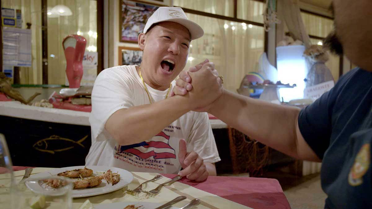 Eddie Huang eating with Paolo Ayeo
