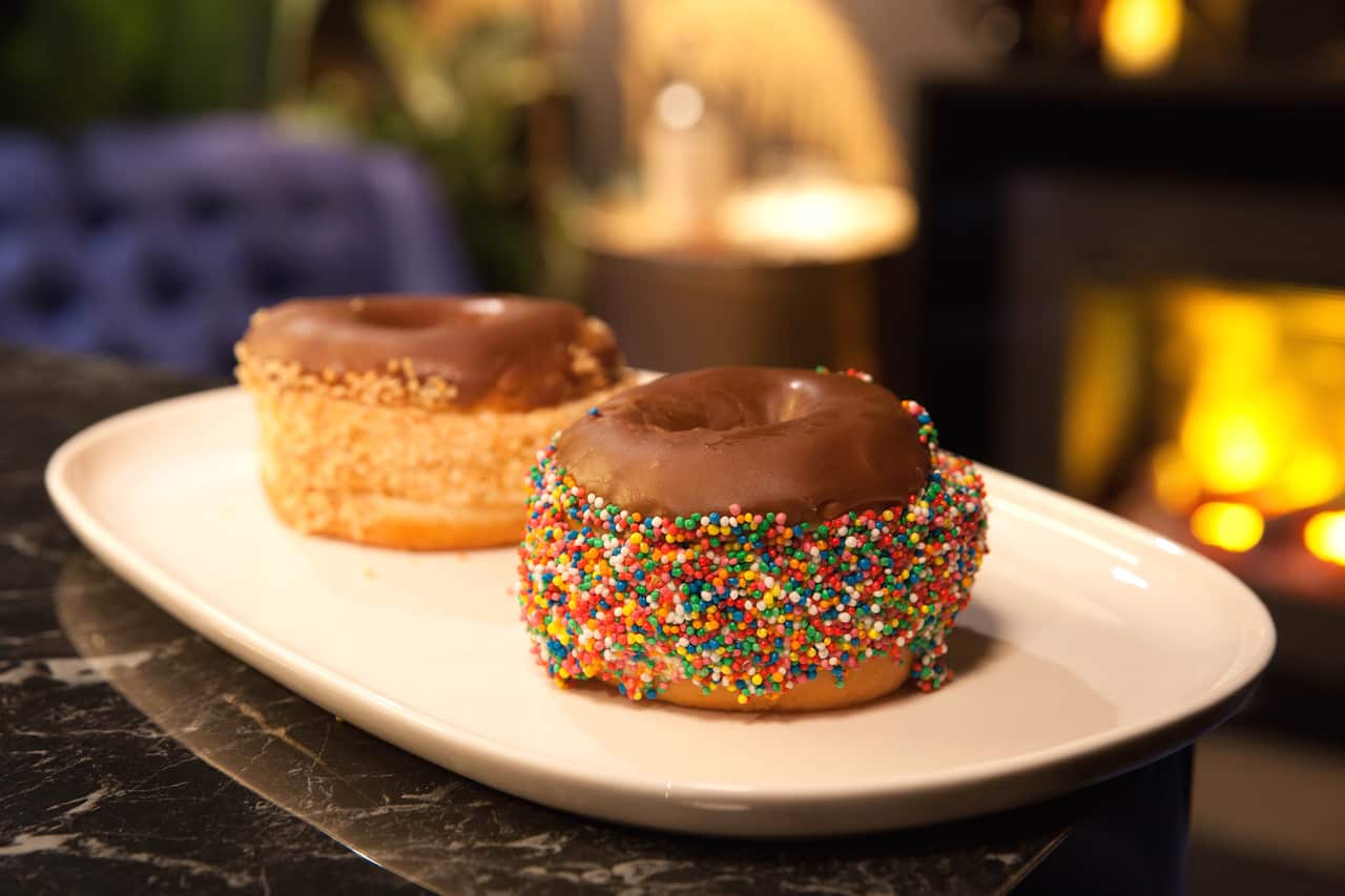 Iced doughnut ice cream sandwiches with sprinkles