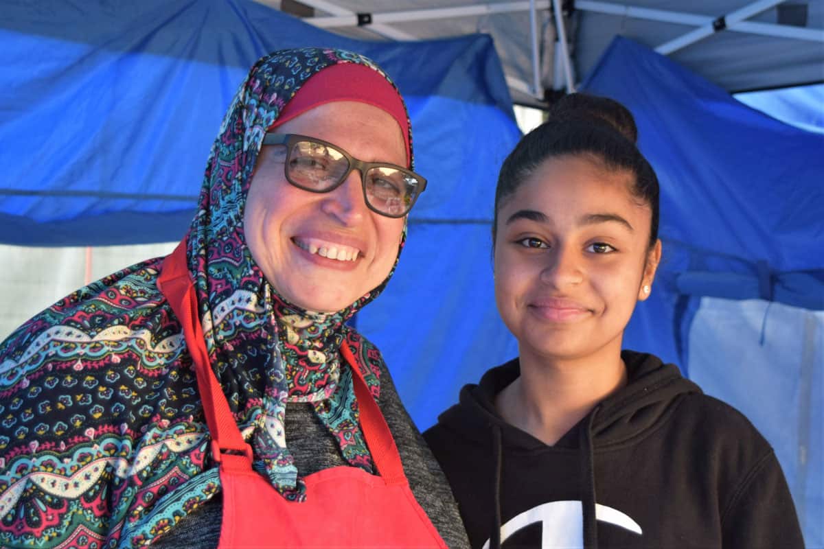 Sara and her daughter sharing their family's koshari recipe at the markets.