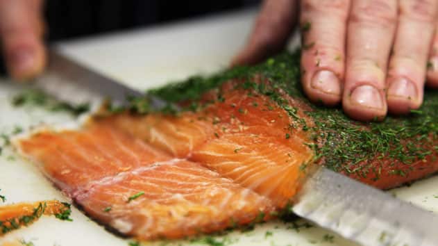 Slicing cured salmon