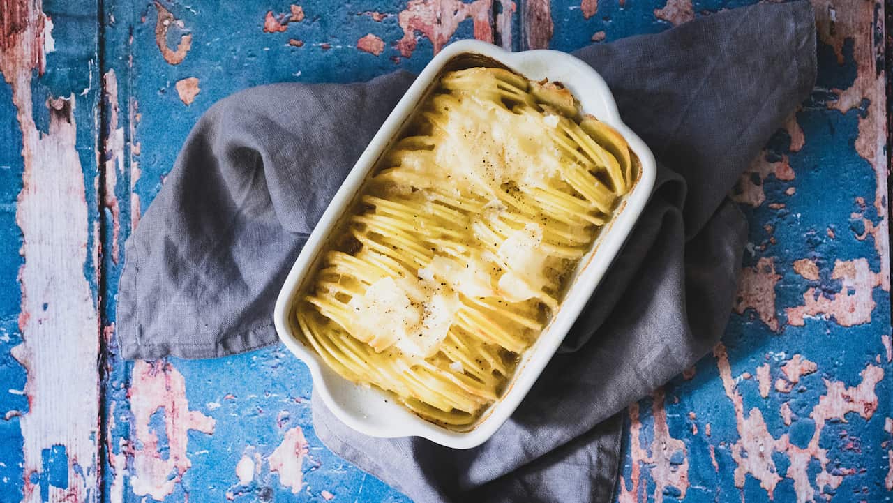 Cacio e pepe hasselback potatoes