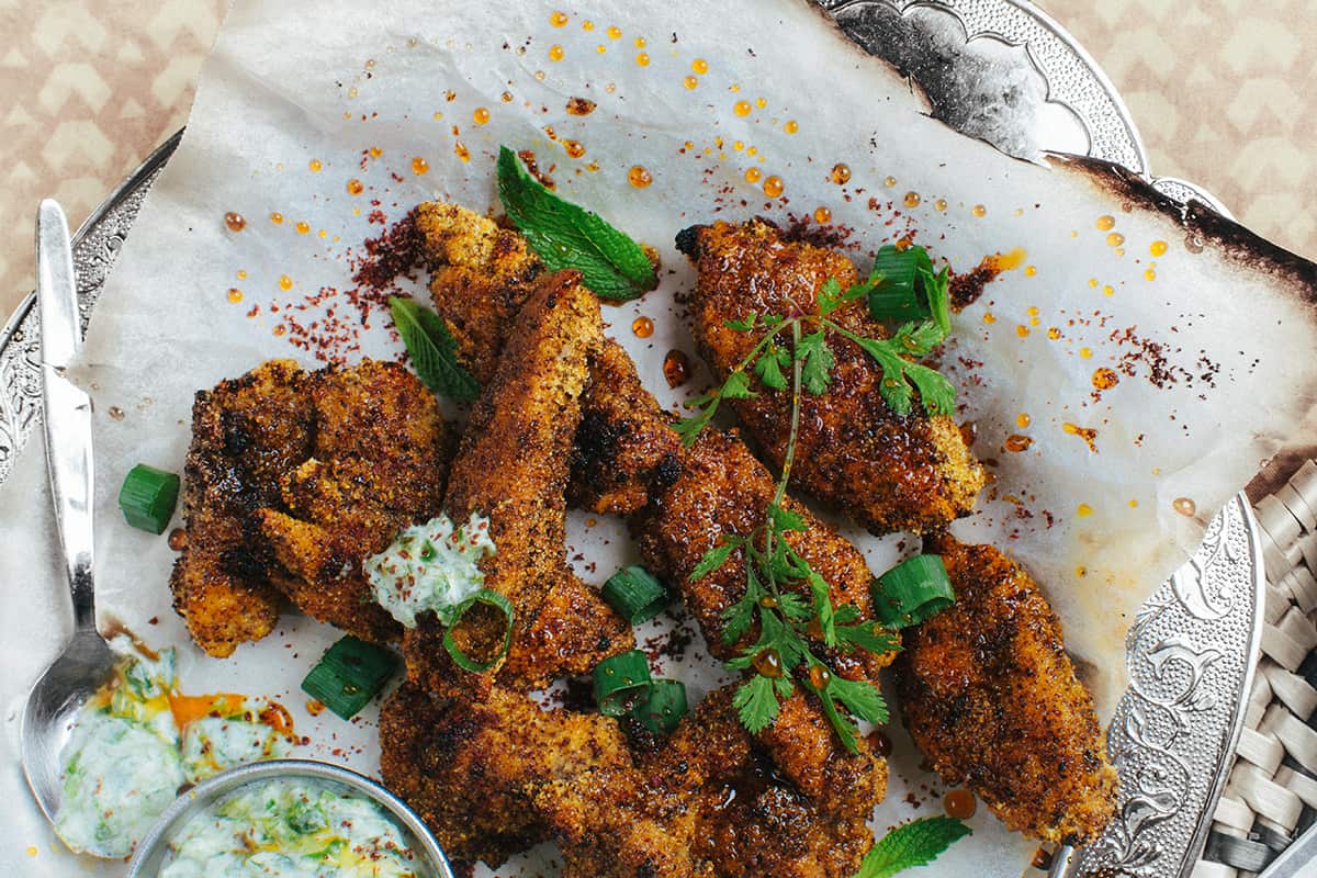 Polenta-crusted sumac chicken with minted yoghurt