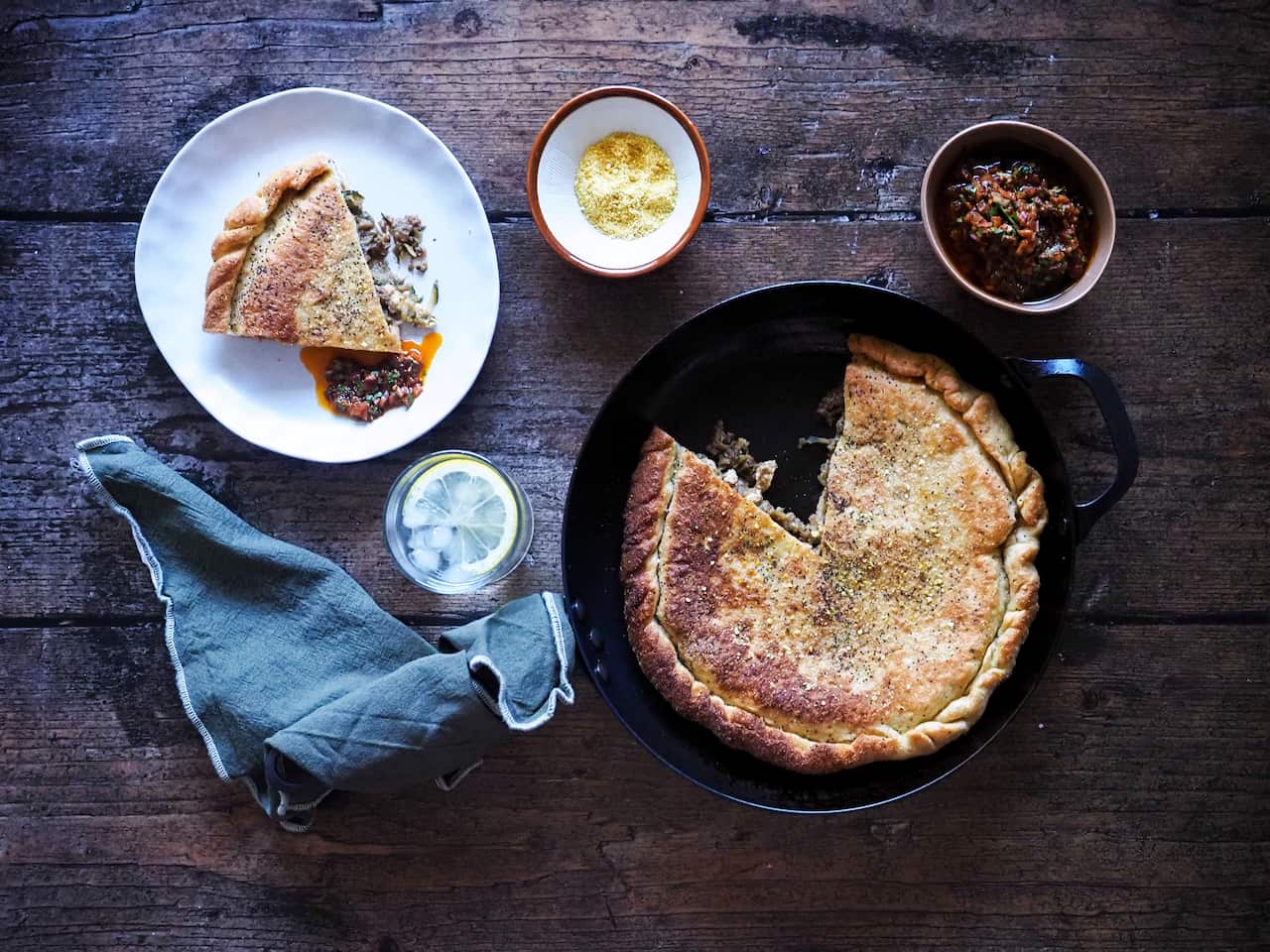 Preserved lemon and vegetable medfouna served with chermoula on the side