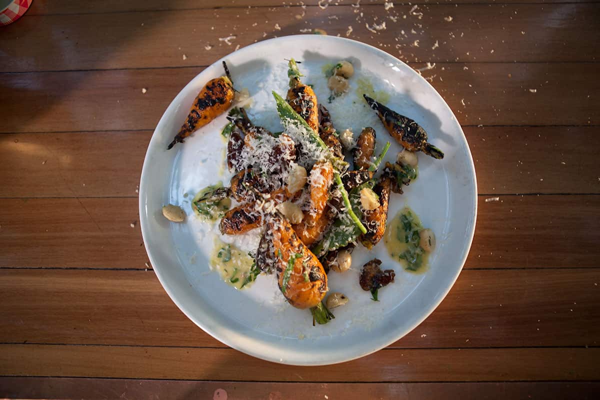 Charred carrot salad with sorrel, macadamia and herb vinaigrette