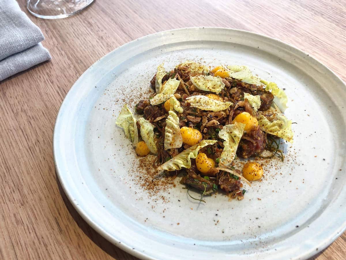 Cured kangaroo, butter lettuce, smoked egg yolk and toasted rice.