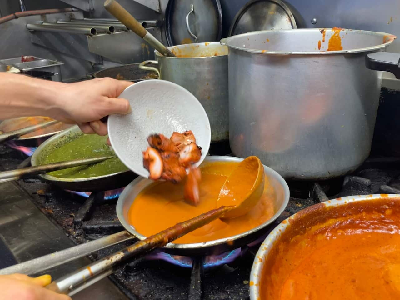 Arron Singh makes his father's secret butter chicken recipe. 