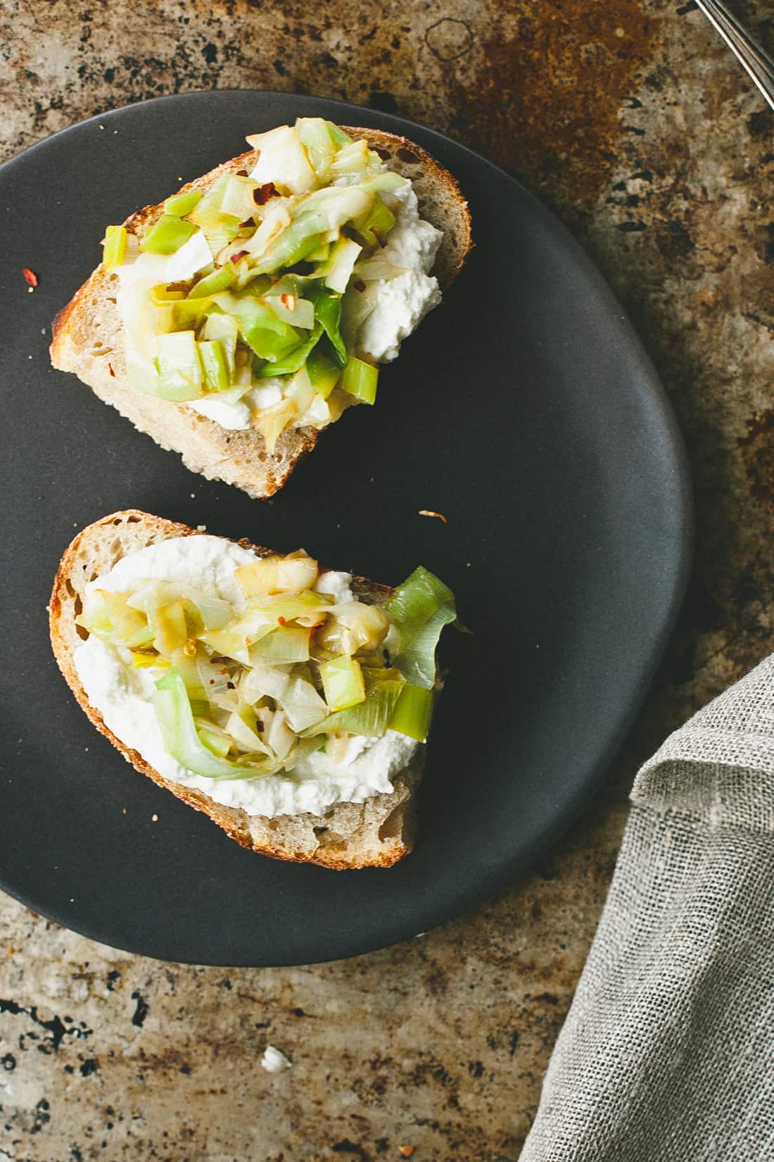 Melted leek and ricotta tartine