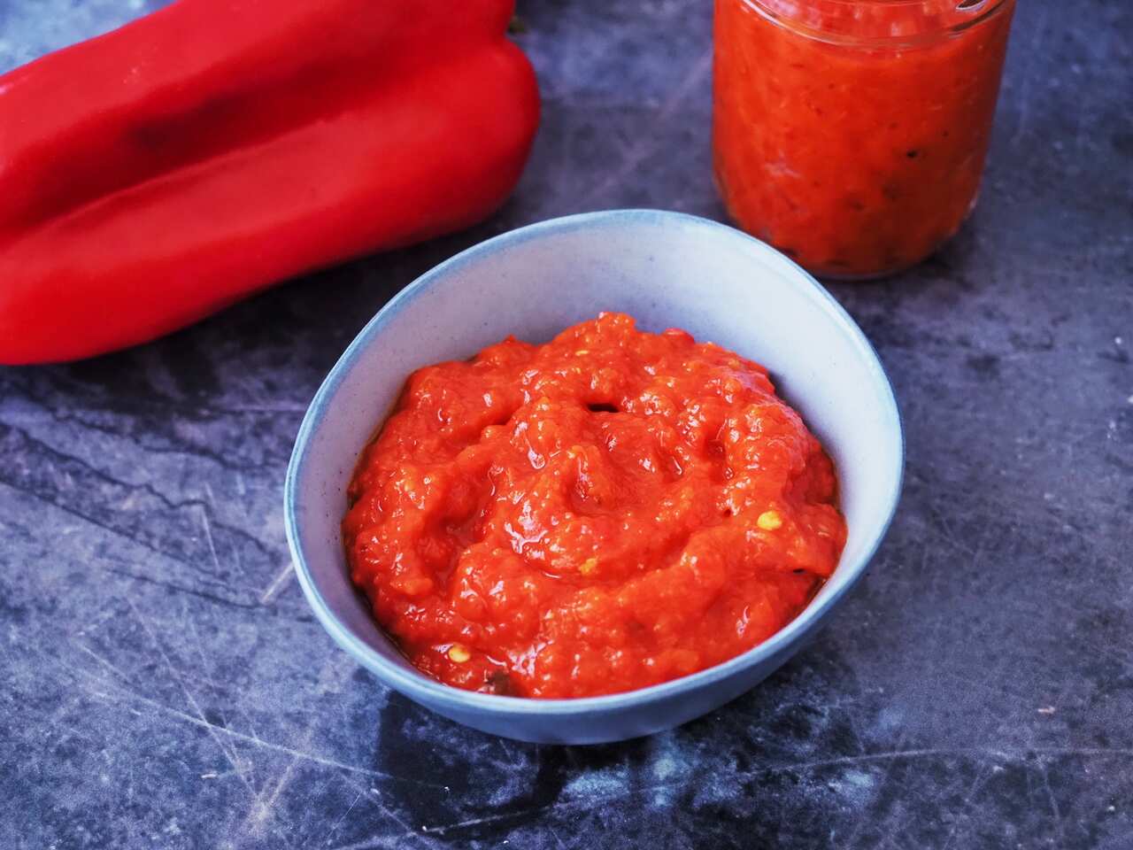 Ajvar, a Bosnian capsicum relish is served in a small bowl