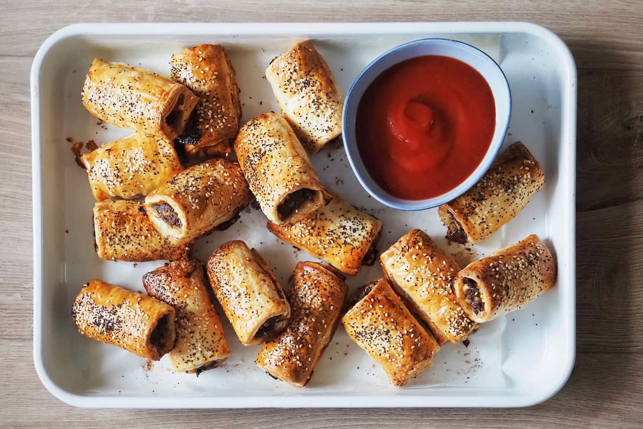 Lamb and haloumi sausage rolls, served with ketchup on the side. 