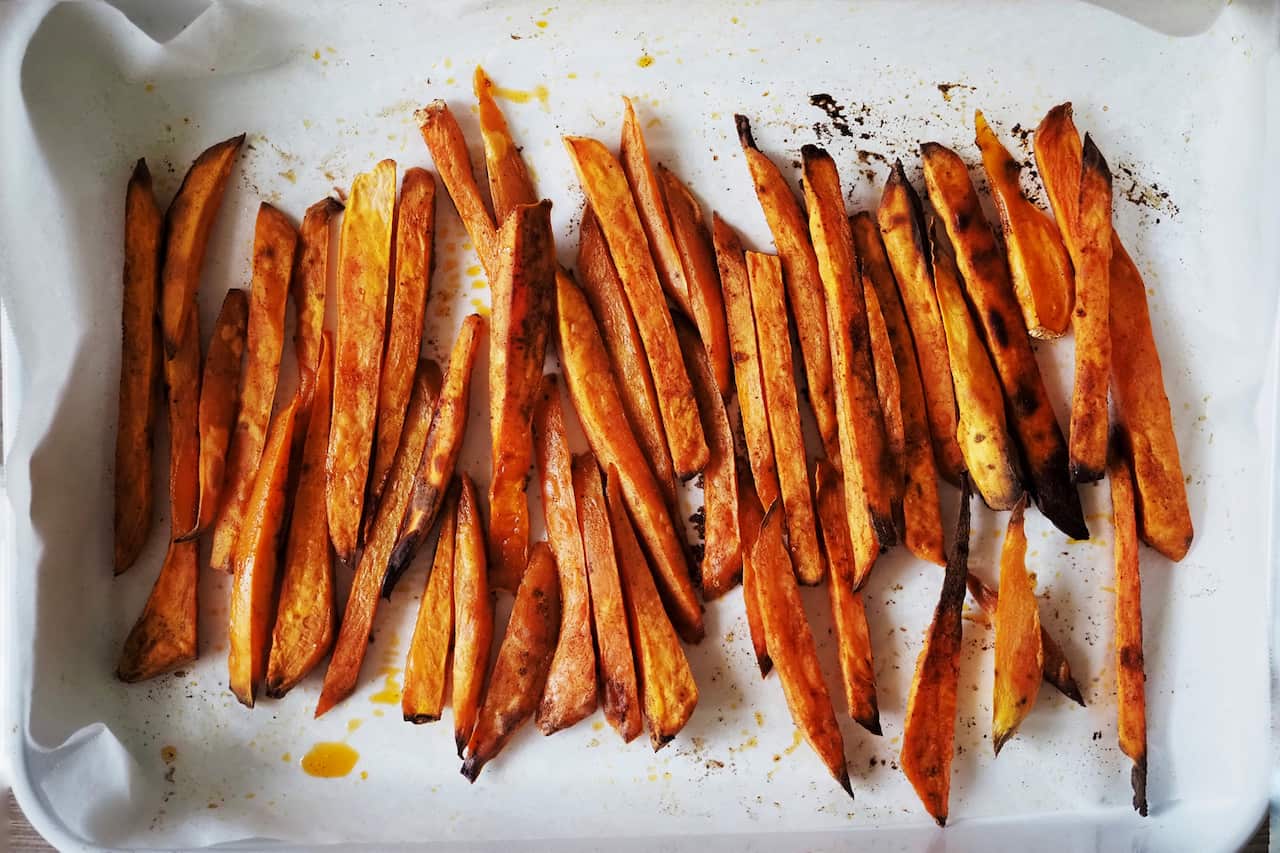 Crispy sweet potato fries roasted with paprika and coconut oil