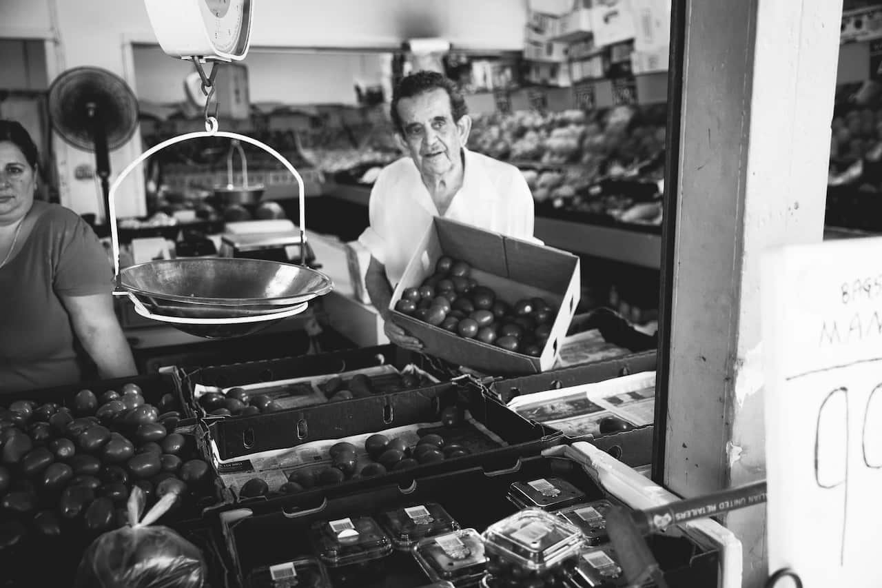 Andy at his fruit shop, which is now Miss Bliss Whole Foods Kitchen.