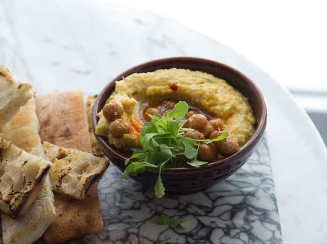 Warm chicpea dip arrives with Afghan bread for dipping.